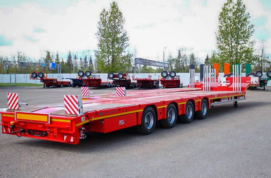 Низкорамный трал Тверьстроймаш 993941 на тягаче КАМАЗ 5490